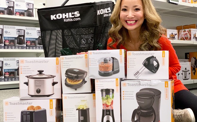 A Person Smiling and Sitting Next to Eight Toastmaster Kitchen Appliances at Kohl's