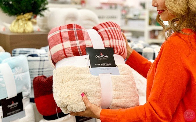 A Person Holding a Cozy Soft Throw at a Kohl's Store