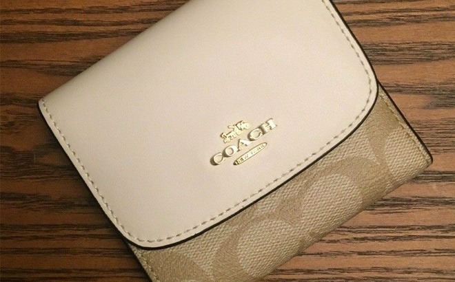 Coach outlet wallet sale shop