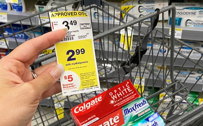 A Hand Holding a Walgreen Price Tag