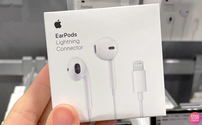 A Hand Holding Apple EarPods with Lightning Connector at a Store