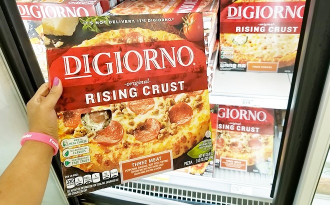 Hand Holding DiGiorno Pizza Rising Crust