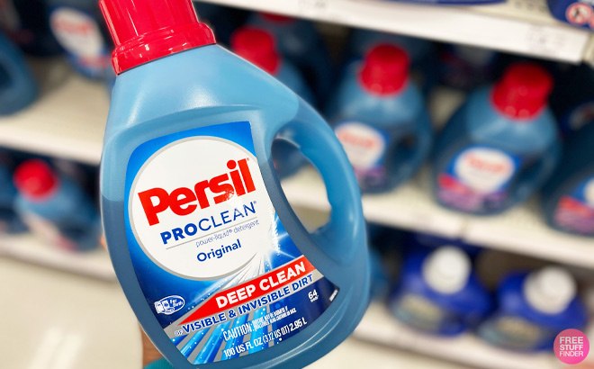 a Person Holding Persil Original Liquid Laundry Detergent