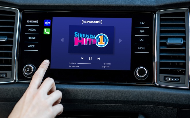 Hand Changing Channels on a SiriusXM Radio