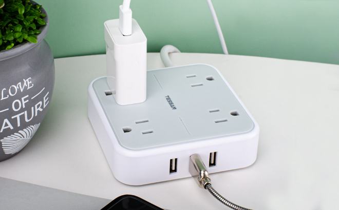 4-Outlet Power Strip with 3 USB Ports $14