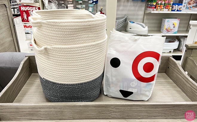 Target Baby Gift Bag next to Baskets on a Wooden Tray