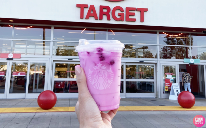 Hand Holding a Starbucks Drink in Front of Target Store
