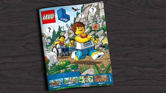 LEGO Magazine Cover on a Dark Wooden Surface