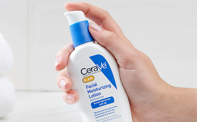Hand Holding a CeraVe AM Moisturizing Lotion with Sunscreen