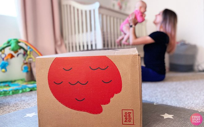 Hello Bello Box with Mom and a Baby in the Background