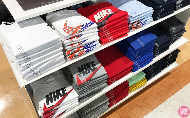 Nike Graphic Tees on a Store Shelf