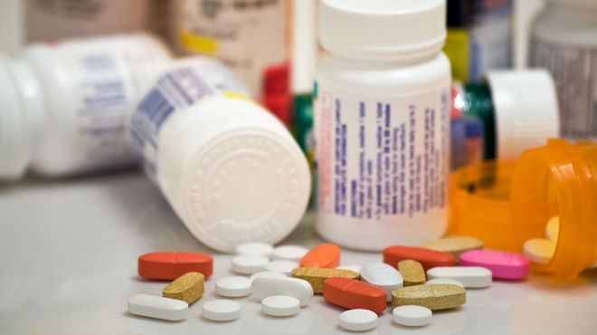 Bottles of Medication and Pills on a Tabletop