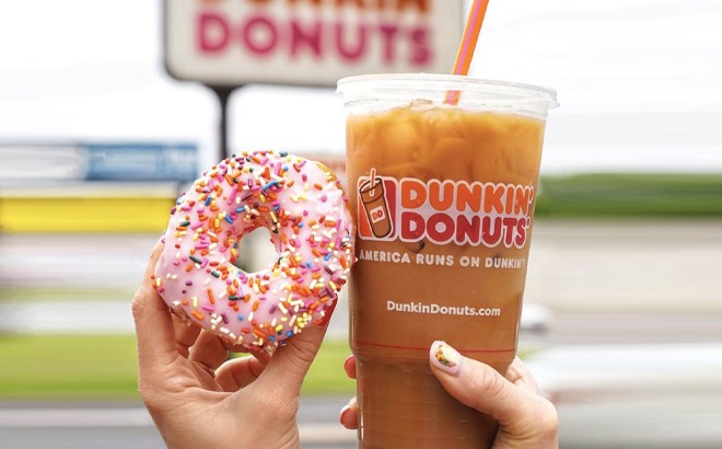 Hands Holding Dunkin' Donuts Drink and Donut