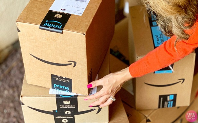 A Woman Grabbing Amazon Packages