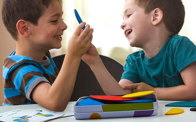 Kids Playing with Wooden Pattern Blocks