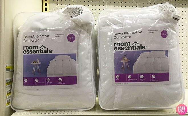Two Room Essentials Down Alternative Comforters on a Store Shelf