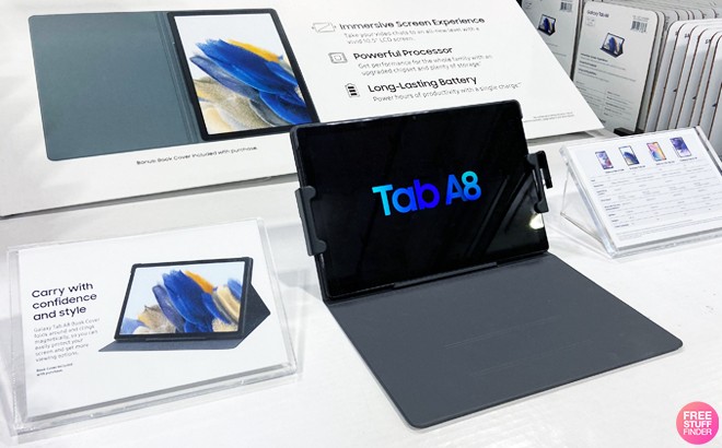 Samsung Galaxy Tab A8 10.5-Inch 64GB Tablet and Book Cover on Display at a Store