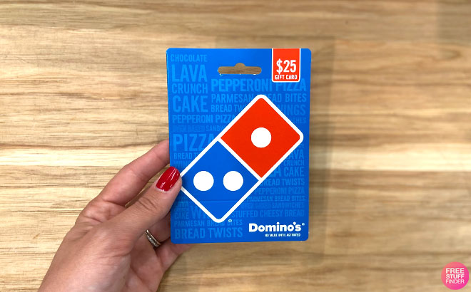 A Person Holding a $25 Domino's Gift Card