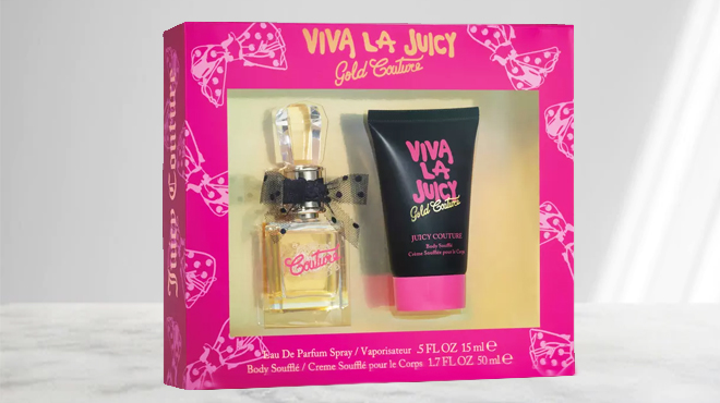 Juicy Couture Viva La Juicy Gold Couture 2-Piece Fragrance Gift Set on a Tabletop