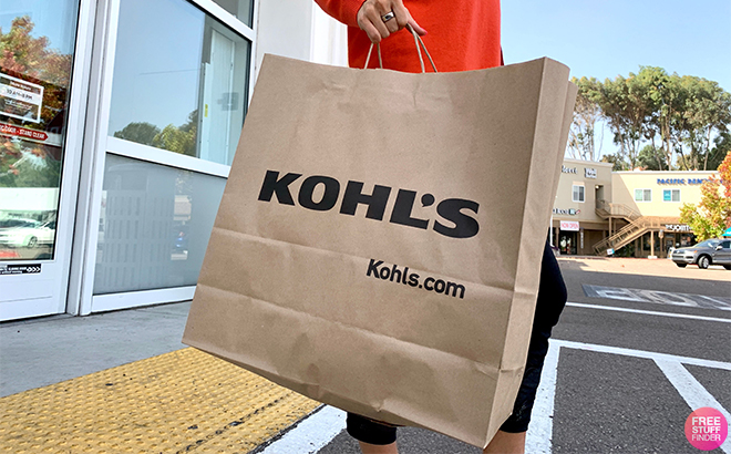 Tina Carrying a Kohls Paper Bag Coming Out of the Kohls Store
