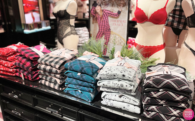 Victoria’s Secret Pajama Sets on a Shelf at a Victoria’s Secret Store