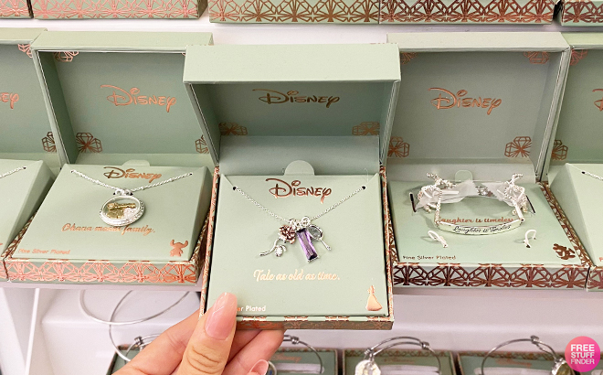 A Hand Holding an 18-Inch Disney Classics Cable Beauty and the Beast Pendant Necklace at JCPenney