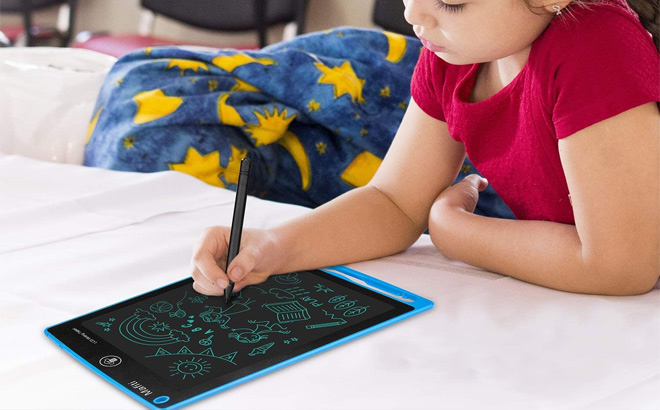 A Child Using an 8 5 Inch Writing Tablet