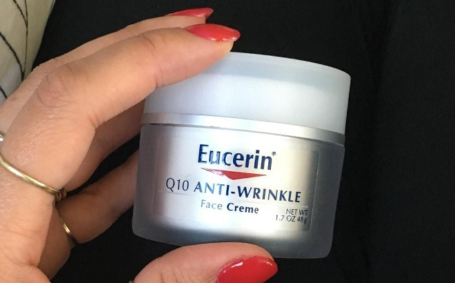 A Hand Holding a Eucerin Anti Wrinkle Cream