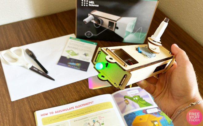 A Person Showing a Partially Finished Mel Science Project