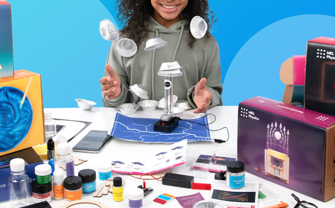 Girl Doing a Fun Experiment with Mel Physics Science Kit