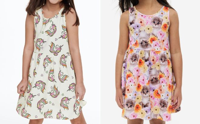 Girls are Wearing HM Patterned Cotton Dress in Natural White Color with Unicorns on the Left Side and in Light Pink Color with Kitten on the Right Side