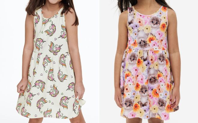 Girls are Wearing HM Patterned Cotton Dress in Natural White Color with Unicorns on the Left Side and in Light Pink Color with Kitten on the Right Side Girls are Wearing HM Patterned Cotton Dress in Natural White Color with Unicorns on the Left Side and in Light Pink Color with Kitten on the Right Side