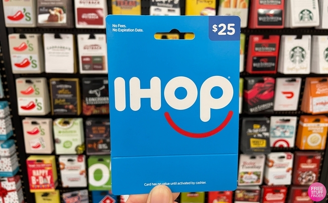 Woman Holding an IHOP Gift Card in Store