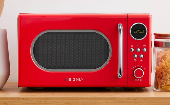 Insignia Retro Compact Red Microwave on kitchen counter