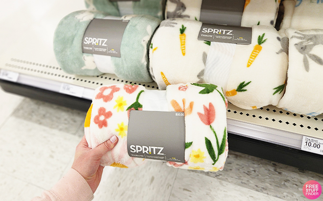 Spritz Easter Throw Blanket on a Shelf