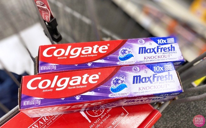 Two 6 Ounce Colgate Max Toothpastes on a CVS cart