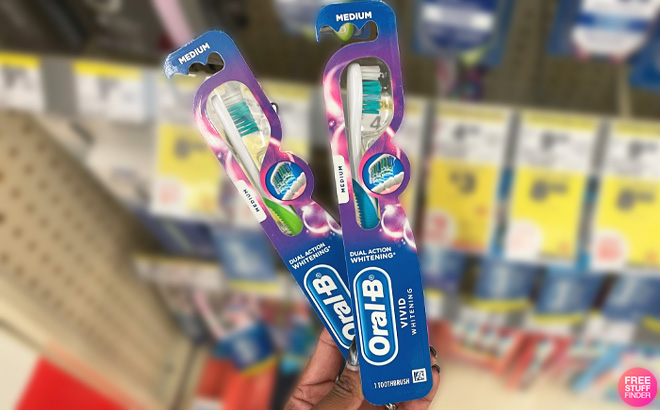 Two Oral B Vivid Whitening Manual Toothbrushes