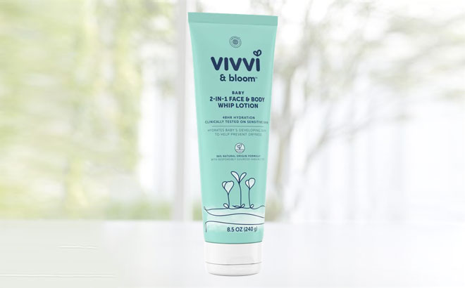 Vivvi Bloom Face and Body Lotion Sample on a Glass Tabletop