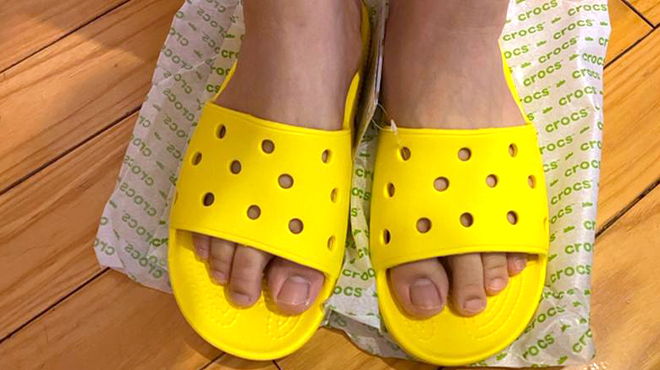 Crocs Women's Classic Slide Sandals in Yellow color