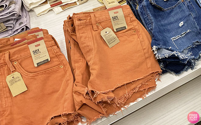 Levi's Women's 501 Original Jean Shorts in Autumn Leaf Day Color on a Table at Kohl's