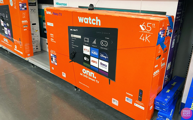 Onn. 65-Inch 4K Roku TV in the Box on a Shelf at Walmart
