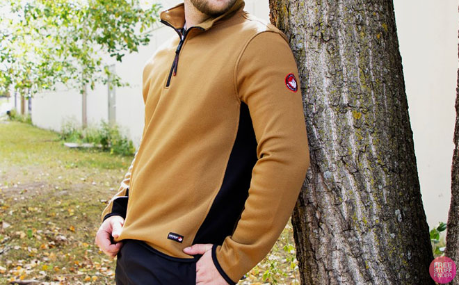 A Man Wearing Canada Weather Gear Men's Fleece in Bronze/Black A Man Wearing Canada Weather Gear Mens Fleece in Bronze and Black 1