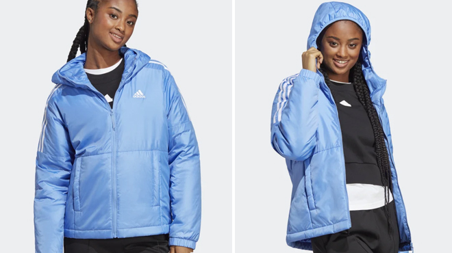 A Model Wearing Adidas Womens Insulatet Hooded Jacket in Blue Fusion Color
