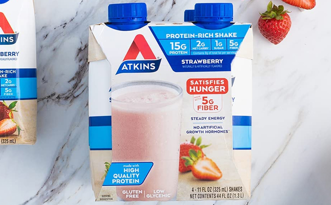 Atkins Strawberry Protein Shakes 4 Count on a Kitchen Countertop