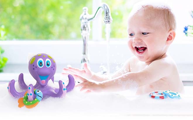Baby playing Floating Purple Octopus Bath Toy