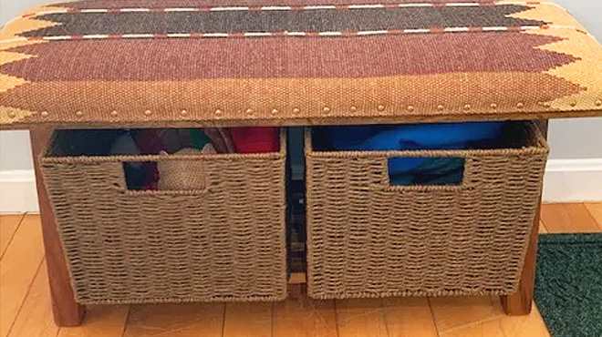 Two Brown Wicker Basket under a table