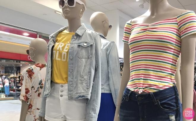 Charlotte Russe Tops on Two Storefront Mannequins