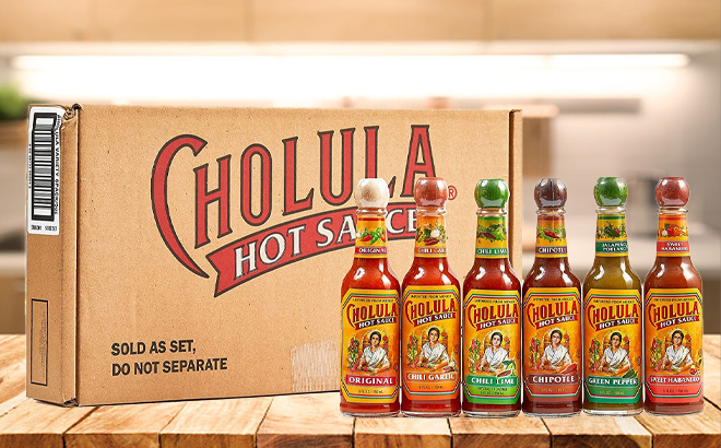 Cholula Hot Sauce 6 Count Variety Pack with Box on a Table