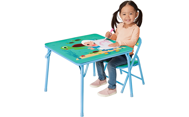 CoComelon Table Chair Set with Little Girl Sitting on the Chair