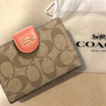 Coach Outlet Medium Corner Zip Wallet In Signature Canvases